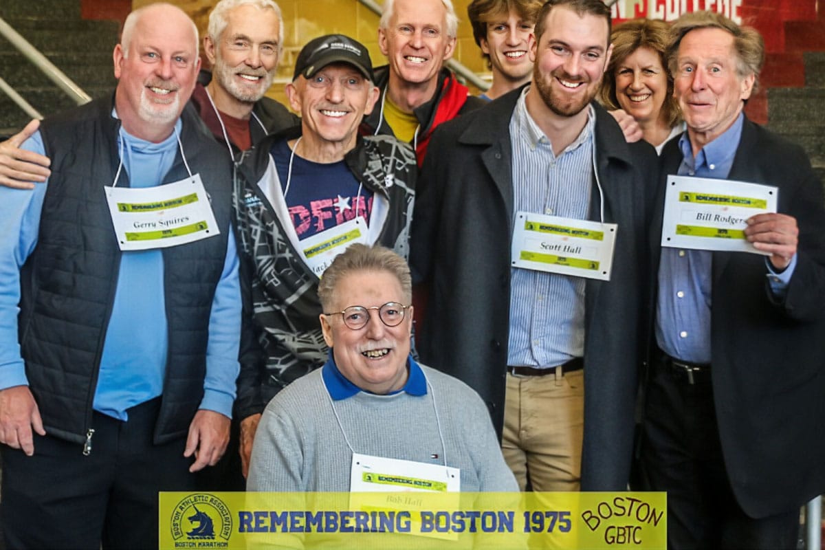 Bob Hall smiling with fellow marathoners at a Remembering Boston 1975 legacy event